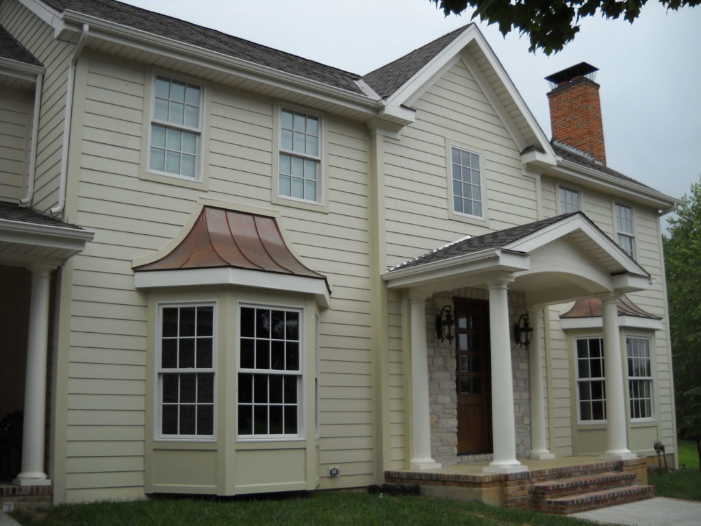 <a href="https://www.sidingexpress.com/completed-jobs/hardieplank-navajo-beige-with-hardiepanel-in-chesterfield-mo-63005/">James Hardie Navajo Beige Lap</a>