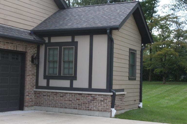 tudor hardiepanel in timber bark and khaki brown lap