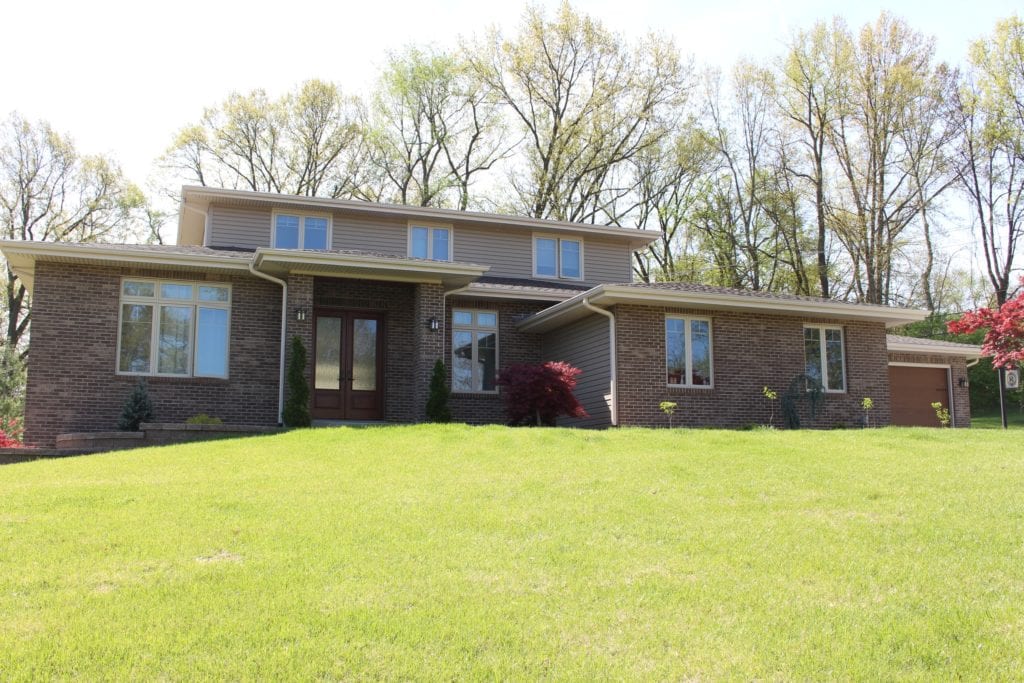 Pebblestone Clay vinyl siding on front elevation