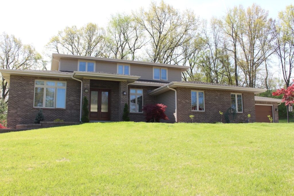 Pebblestone Clay vinyl siding on front elevation