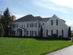 Do you need a James Hardie siding contractor in Wildwood, MO? Call Siding Express to get beautiful tan siding like this house!