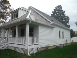 Cedar siding replacement with james hardie siding in St. Charles