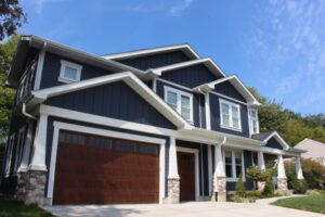 Dark blue siding replacement