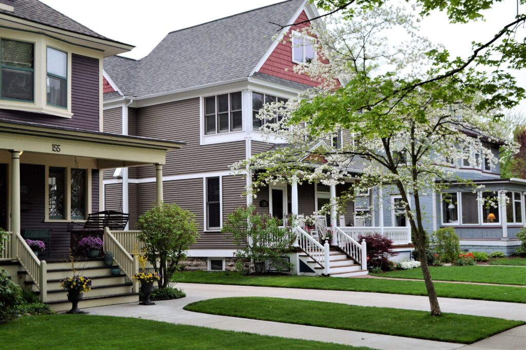 Various siding colors on homes in a neighborhood. 